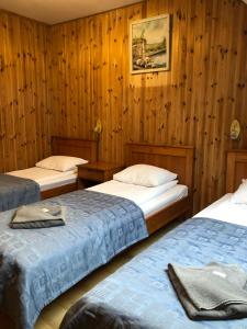 Postel nebo postele na pokoji v ubytování Viesu nams Vālodzes