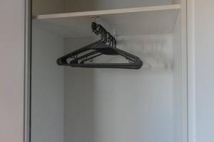 a hanger hanging from a door in a room at RECOLETA APART in Buenos Aires