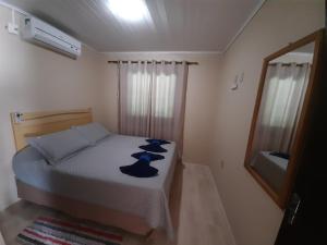 Postel nebo postele na pokoji v ubytování Casa da Cris/Marcelo