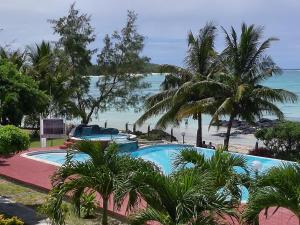 Bazén v ubytování Palmar Beach Villa nebo v jeho okolí