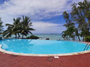 Bazén v ubytování Palmar Beach Villa nebo v jeho okolí + 16 fotografií