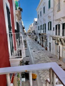 an empty street in a city with buildings at Al Civico 3 CENTRO in Polignano a Mare