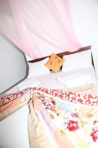 Ein Bett oder Betten in einem Zimmer der Unterkunft Nine Arch Jungle Inn