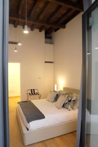 Posteľ alebo postele v izbe v ubytovaní Vista Borgo Antico