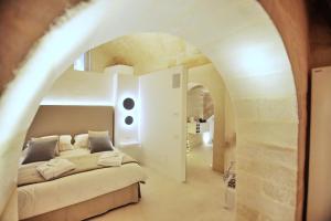 Krevet ili kreveti u jedinici u objektu Anima Pietra Luxury Suite