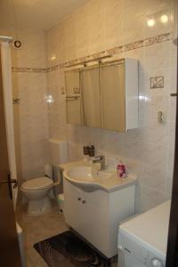 Kúpeľňa v ubytovaní Apartment Zarko