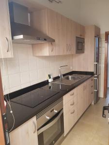 Η κουζίνα ή μικρή κουζίνα στο Vivienda Vacacional la Palmera