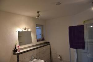 a bathroom with a sink and a mirror at Fewo-Bernkastel-Kues in Bernkastel-Kues