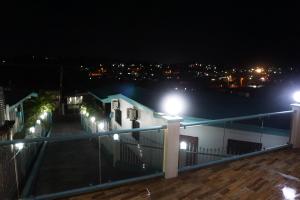 a view of a city at night with street lights at Holiday Hire Fiji in Lautoka