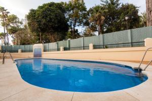 The swimming pool at or close to Beach Front Apartment-1st Line