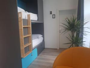 מיטה או מיטות בחדר ב-Freinest Wien