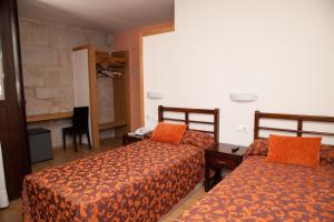 Cama o camas de una habitación en Hotel Boa Vila