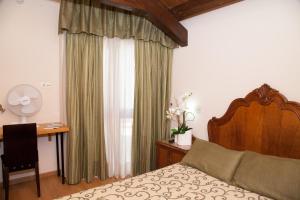 Cama o camas de una habitación en Hotel Boa Vila