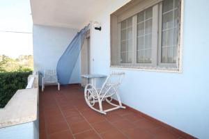 A balcony or terrace at Villetta Campurè