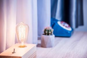 Postel nebo postele na pokoji v ubytování Hotel Marienplatz Podgorica