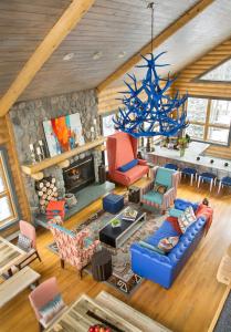 a living room filled with furniture and decor at The Bivvi Hostel in Breckenridge