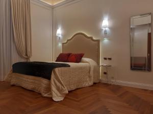 Postel nebo postele na pokoji v ubytování Boutique Hotel Puccini