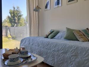 Ένα ή περισσότερα κρεβάτια σε δωμάτιο στο Cubil Gris Casa conteiner 1 dormitorio
