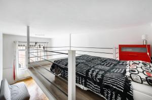 Postel nebo postele na pokoji v ubytování Vanesia Boutique Apartment