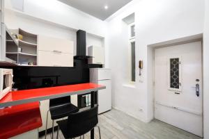 Kuchyň nebo kuchyňský kout v ubytování Vanesia Boutique Apartment + 8 fotografií