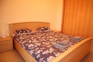 Ein Bett oder Betten in einem Zimmer der Unterkunft Penthouse Luxury Faro Casasol