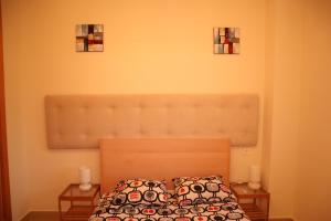 Ein Bett oder Betten in einem Zimmer der Unterkunft Penthouse Luxury Faro Casasol