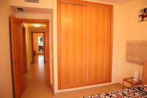 Ein Bett oder Betten in einem Zimmer der Unterkunft Penthouse Luxury Faro Casasol