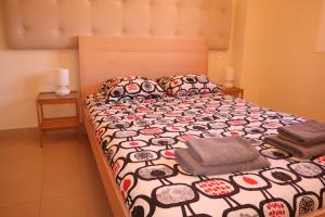 Ein Bett oder Betten in einem Zimmer der Unterkunft Penthouse Luxury Faro Casasol