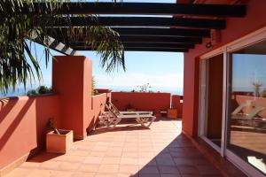 Ein Balkon oder eine Terrasse in der Unterkunft Penthouse Luxury Faro Casasol