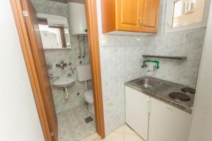 Koupelna v ubytování Apartments Petković + 113 fotografií