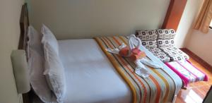Voodi või voodid majutusasutuse Hostal Vista Waynapata 123 toas
