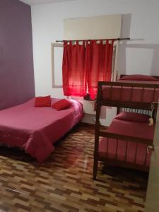 Ένα ή περισσότερα κρεβάτια σε δωμάτιο στο Alquiler zona centro