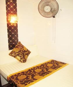 Voodi või voodid majutusasutuse Pay-Less Guesthouse (7/F A9) toas