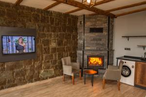 A television and/or entertainment centre at Royal Villa