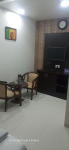 A television and/or entertainment center at Hotel Sai Panchvati