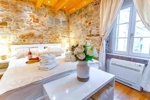 Postel nebo postele na pokoji v ubytování New Lux Villa Merissima