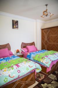 Katil atau katil-katil dalam bilik di Breathtaking Wide Seaview Apartment