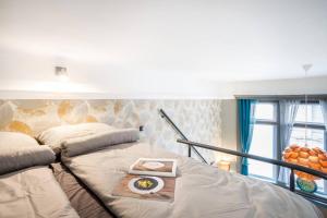 Posteľ alebo postele v izbe v ubytovaní Luxury Pilvax Studio