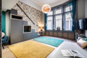 Posteľ alebo postele v izbe v ubytovaní Luxury Pilvax Studio