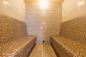 Posezení v ubytování Amarena SPA Hotel - Breakfast included in the price Spa Swimming pool Sauna Hammam Jacuzzi Restaurant inexpensive and delicious food Parking area Barbecue 400 m to Bukovel Lift 1 room and cottages