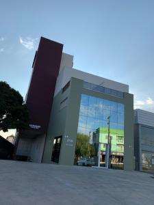 a large building with a lot of windows at Hotel Catarina in São Miguel dʼOeste