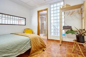 Posteľ alebo postele v izbe v ubytovaní Casa LLimona: La casa perfecta para tus vacaciones.
