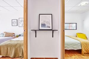 Posteľ alebo postele v izbe v ubytovaní Casa LLimona: La casa perfecta para tus vacaciones.