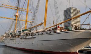 a large sail boat sitting in the water at 22ndFloor Luxury Suite in Ostend