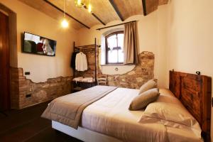 Borgo Degli Angeli Resort e Spa客房内的一张或多张床位