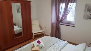Postel nebo postele na pokoji v ubytování Apartman Ivan