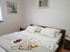Postel nebo postele na pokoji v ubytování Apartman Ivan
