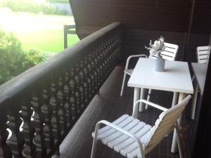 Balkoni atau teres di Appartement in der Waldsiedlung +4 gambar