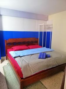 מיטה או מיטות בחדר ב-Banphe​ Hostel