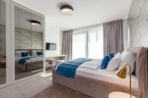 Ένα ή περισσότερα κρεβάτια σε δωμάτιο στο Villa Eleven +33 φωτογραφίες